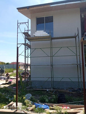 Construction of a House with Completed Facades Using Decorative Exterior Plaster thumbnail