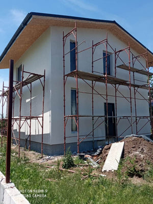 Construction of a House with Completed Facades Using Decorative Exterior Plaster thumbnail