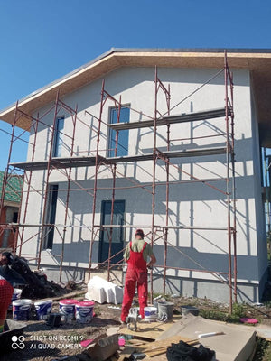 Construction of a House with Completed Facades Using Decorative Exterior Plaster thumbnail