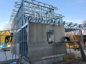 Construction of a Metal House Exterior Cladding with Fiber Cement and Basalt Wool Insulation thumbnail