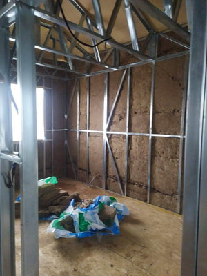 Construction of a Metal House Insulation of Interior Walls with Basalt Wool thumbnail