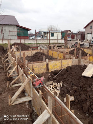 Construction of a Metal Structure House Reinforcing Beams with Planting Reinforcement and Formwork thumbnail