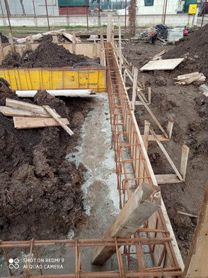 Construction of a Metal Structure House Reinforcing Beams with Planting Reinforcement and Formwork thumbnail