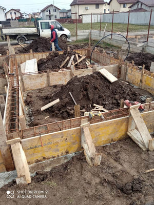 Construction of a Metal Structure House Reinforcing Beams with Planting Reinforcement and Formwork thumbnail