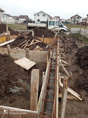 Construction of a Metal Structure House Reinforcing Beams with Planting Reinforcement and Formwork thumbnail