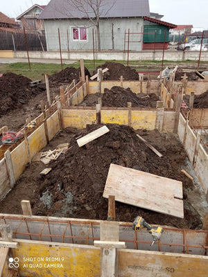 Construction of a Metal Structure House Reinforcing Beams with Planting Reinforcement and Formwork thumbnail