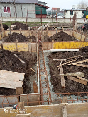 Construction of a Metal Structure House Reinforcing Beams with Planting Reinforcement and Formwork thumbnail