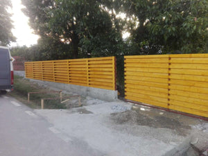 Construction of a Concrete and Wood Fence GA03 thumbnail