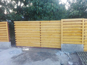 Construction of a Concrete and Wood Fence GA03 thumbnail