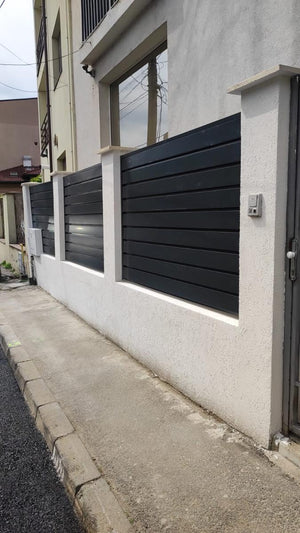 Construction of a Fence with Concrete Posts and Modern Profile Metal Panels thumbnail
