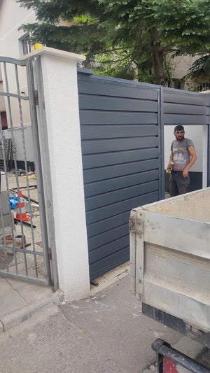 Construction of a Fence with Concrete Posts and Modern Profile Metal Panels thumbnail