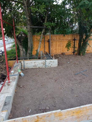 Construction of a Concrete Fence with Anthracite Gray Metal Strips, Gates, and Pedestrian Alley thumbnail