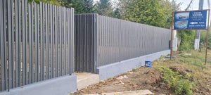 Construction of a Concrete Fence with Anthracite Gray Metal Strips, Gates, and Pedestrian Alley thumbnail