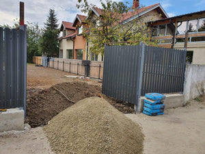 Construction of a Concrete Fence with Anthracite Gray Metal Strips, Gates, and Pedestrian Alley thumbnail