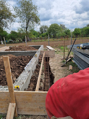 Formwork Removal for Foundation Beams, Application of Bituminous Layer, and Backfilling with Soil thumbnail