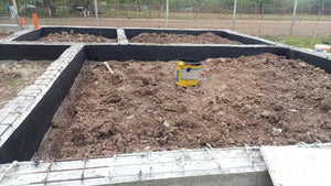 Formwork Removal for Foundation Beams, Application of Bituminous Layer, and Backfilling with Soil thumbnail