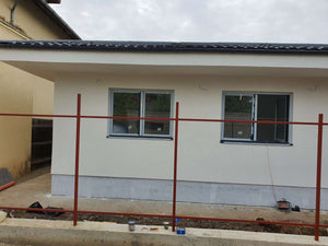 Completed Facades with Siliconized Decorative Plaster and Fence for a Single-Story House in Ilfov thumbnail