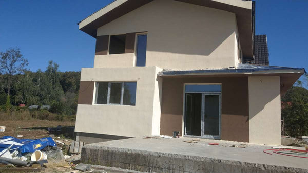 Finisaj exterior structurat scoarta de copac casa metalica