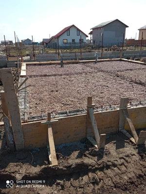 Compact and Prepare the Ground for Pouring a Slab over Soil for a Metal House thumbnail