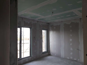 Applying Fine Wall Putty Finish to Interior Walls of a 190 sqm House Construction thumbnail