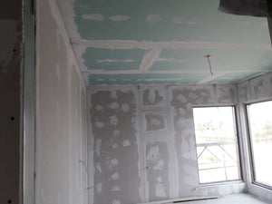 Applying Fine Wall Putty Finish to Interior Walls of a 190 sqm House Construction thumbnail