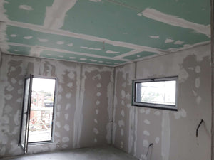 Applying Fine Wall Putty Finish to Interior Walls of a 190 sqm House Construction thumbnail