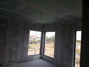 Applying Fine Wall Putty Finish to Interior Walls of a 190 sqm House Construction thumbnail