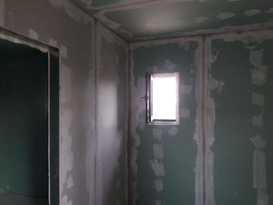 Applying Fine Wall Putty Finish to Interior Walls of a 190 sqm House Construction thumbnail
