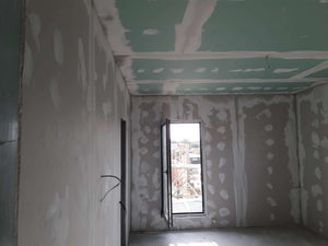Applying Fine Wall Putty Finish to Interior Walls of a 190 sqm House Construction thumbnail
