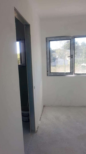 Plastering of Interior Walls and Ceilings with Primer and Vinarom for a Saftica House thumbnail