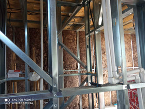 Interior Wall Closures for a 2-Story House with Mineral Wool Insulation thumbnail