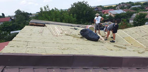 Roof Insulation with Mineral Wool and Installation of Metal Tiles thumbnail