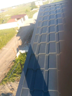 Installation of Metal Tile Roofing on a House Built in Berceni thumbnail