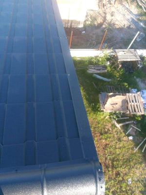 Installation of Metal Tile Roofing on a House Built in Berceni thumbnail