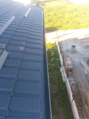 Installation of Metal Tile Roofing on a House Built in Berceni thumbnail