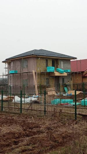Installation of Metal Tile Roofing on a Two-Story House thumbnail