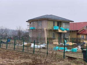 Installation of Metal Tile Roofing on a Two-Story House thumbnail