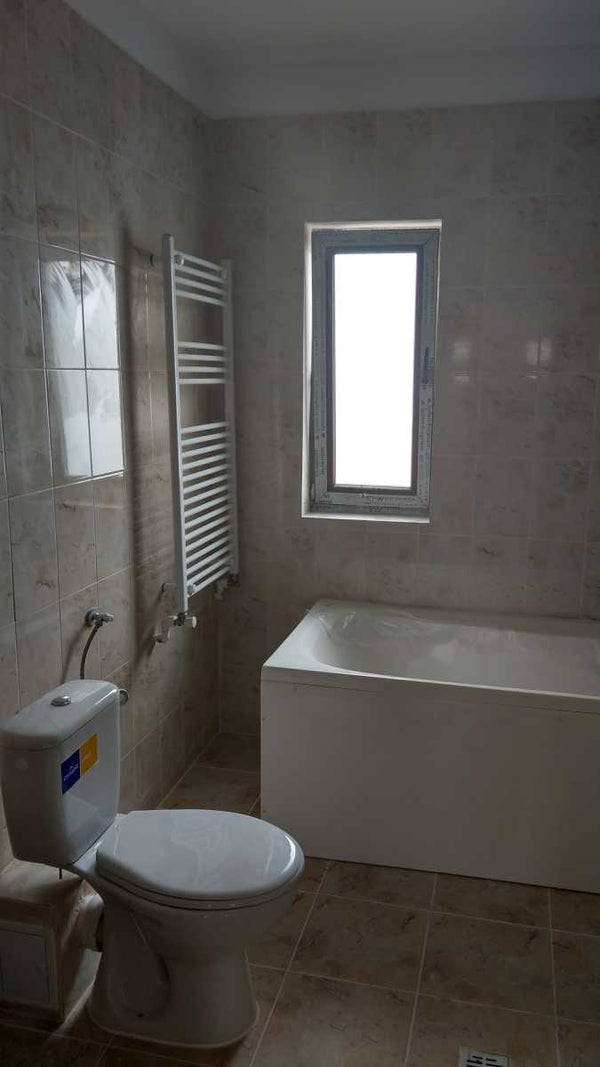 Montaj obiecte sanitare si calorifer in baie casa la cheie