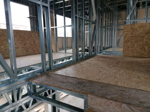 Installation of OSB Panels for 2-Story Floor in Metal House Construction thumbnail