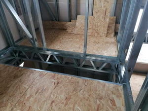 Installation of OSB Panels for 2-Story Floor in Metal House Construction thumbnail