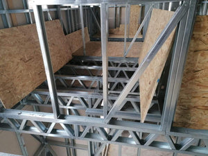 Installation of OSB Panels for 2-Story Floor in Metal House Construction thumbnail