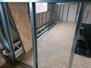 Installation of OSB Panels for 2-Story Floor in Metal House Construction thumbnail