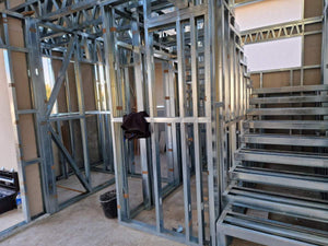 Installation of a Metal Staircase with 2 Ramps, a Landing, and a Slab Between Levels thumbnail