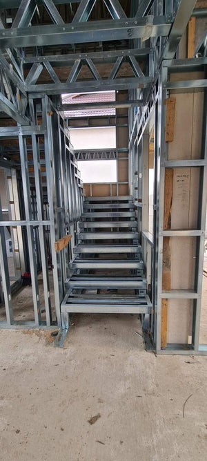 Installation of a Metal Staircase with 2 Ramps, a Landing, and a Slab Between Levels thumbnail