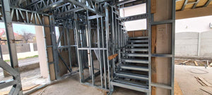 Installation of a Metal Staircase with 2 Ramps, a Landing, and a Slab Between Levels thumbnail