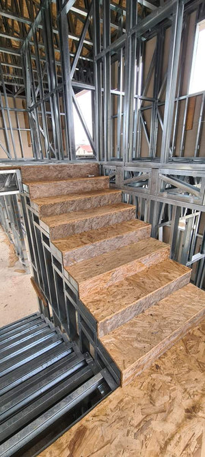 Installation of a Metal Staircase with 2 Ramps, a Landing, and a Slab Between Levels thumbnail