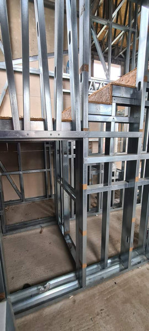 Installation of a Metal Staircase with 2 Ramps, a Landing, and a Slab Between Levels thumbnail