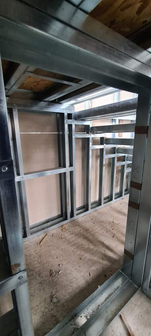 Installation of a Metal Staircase with 2 Ramps, a Landing, and a Slab Between Levels thumbnail