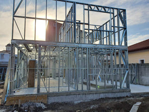 Installation of Metal Frame for a House Equipped in Gold thumbnail