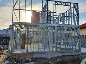 Installation of Metal Frame for a House Equipped in Gold thumbnail